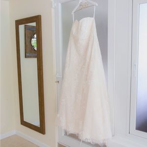 Monique Luo Strapless Lace A-Line Wedding Dress in Ivory with bustle size 20W.